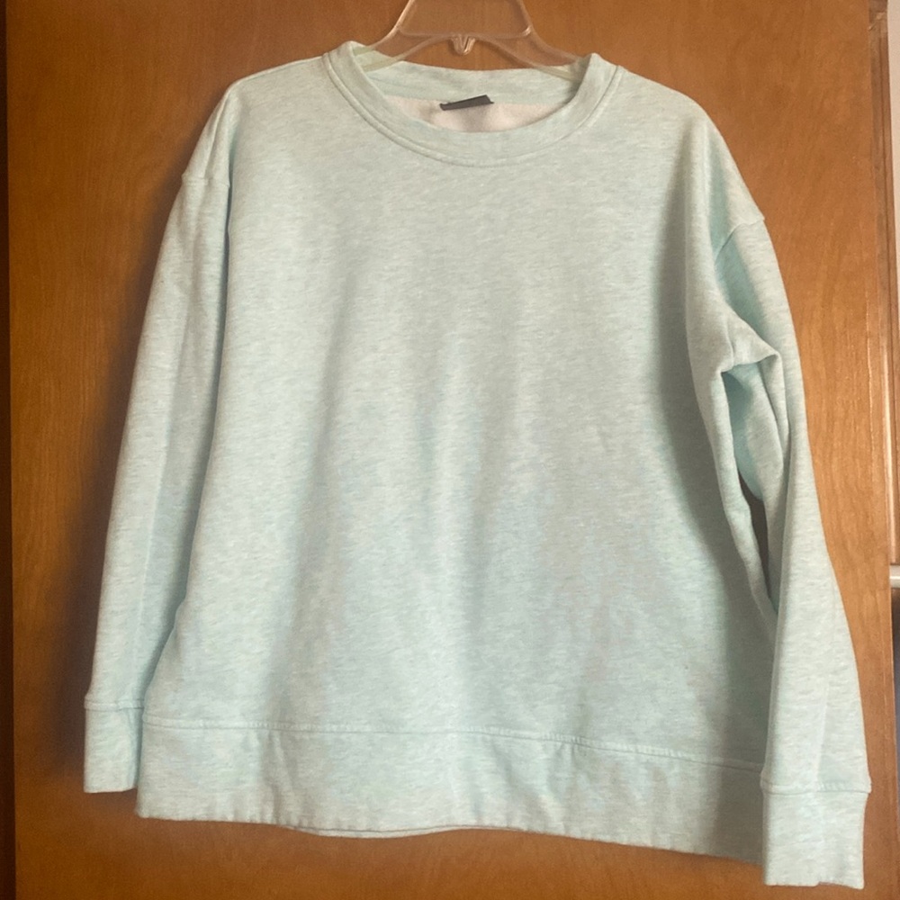 light green and white sweatshirt..size L